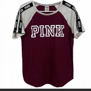 Pink Victoria’s Secret size large shirt.